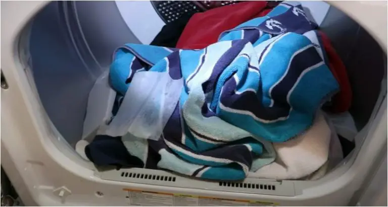 can you dry different colors clothes together in a dryer machine